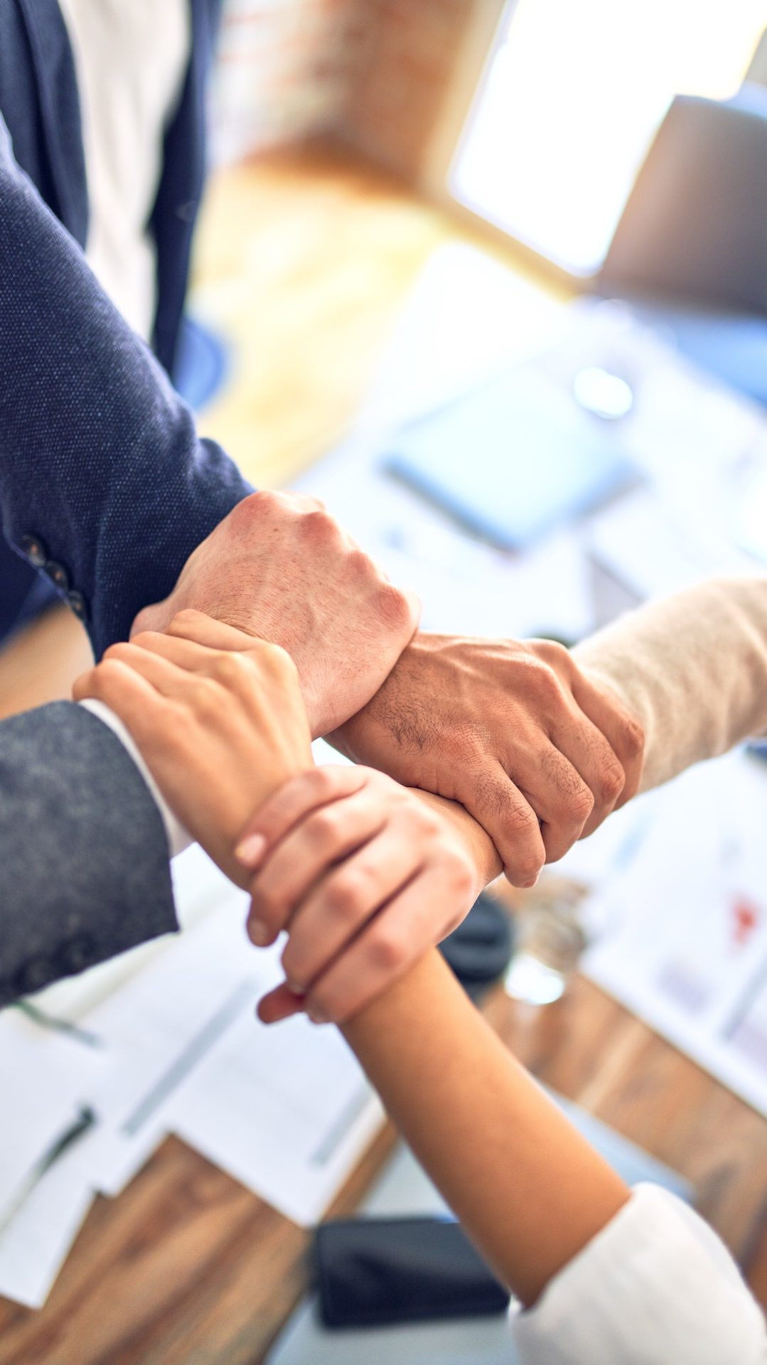 Photo by Kraken Images: https://www.pexels.com/photo/people-holding-each-other-s-arms-5426376/